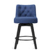 Navy upholstered swivel bar stool  with tufed design,back ,round seat and foot rest