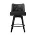 Black upholstered swivel bar stool  with tufed design,back and foot rest