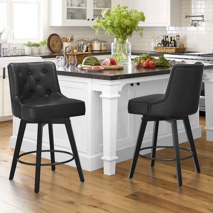 2 pcs black upholstered swivel bar stool in a kitchen  with tufed design,back and foot rest
