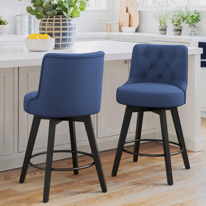 2 pcs navy upholstered swivel bar stool in a kitchen with tufed design,back ,round seat and foot rest