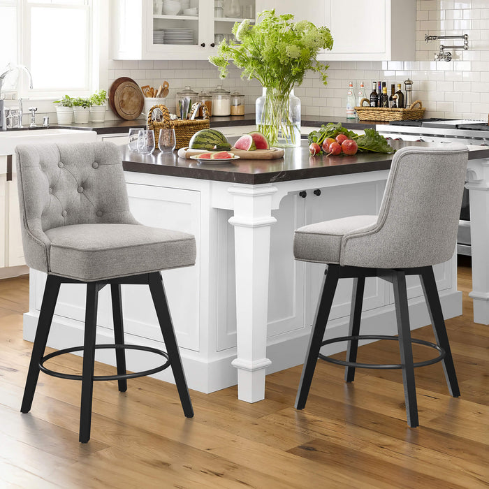 2 pcs gray upholstered swivel bar stool in a dining room with tufed design,back and foot rest
