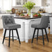 2 pcs dark grey upholstered swivel bar stool in a kitchen with tufed design,back and foot rest