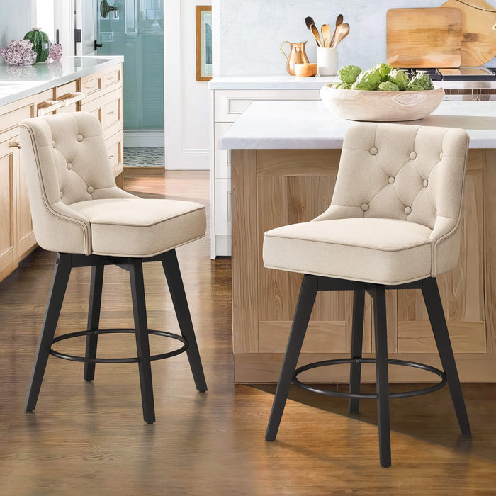 2 pcs linen color upholstered swivel bar stool in a dining room with tufed design,back and foot rest