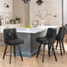3 pcs black upholstered swivel bar stool in a dining room with tufed design,back and foot rest