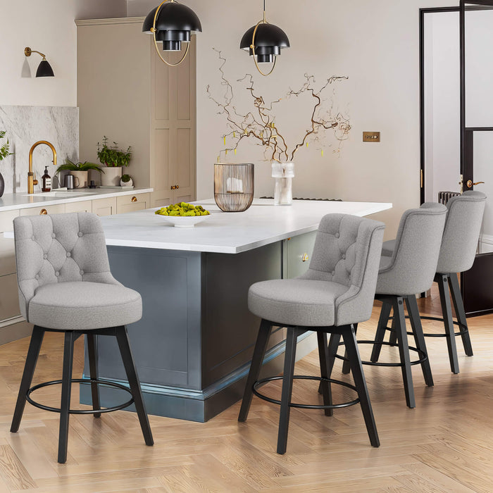 4 pcs gray upholstered swivel bar stool in a dining room with tufed design,back ,round seat and foot rest