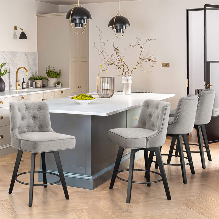 4 pcs gray upholstered swivel bar stool in a dining room with tufed design,back and foot rest