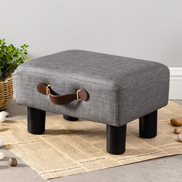 grey leather cushioned footrest with handle